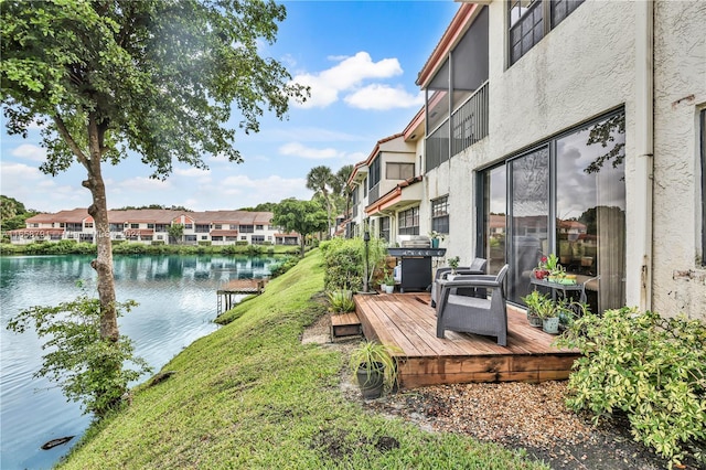 3507 Emerald Oaks Dr Unit 1804, Hollywood, FL 33021 - view of yard with a residential view and a deck with water view