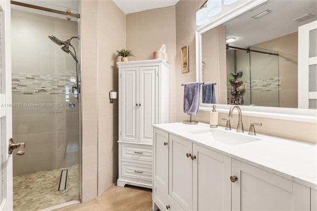 3507 Emerald Oaks Dr Unit 1804, Hollywood, FL 33021 - full bath featuring vanity, visible vents, tile walls, and a shower stall