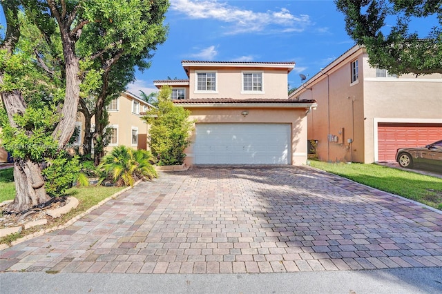 view of front of property featuring a garage