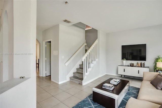 living room featuring tile patterned floors