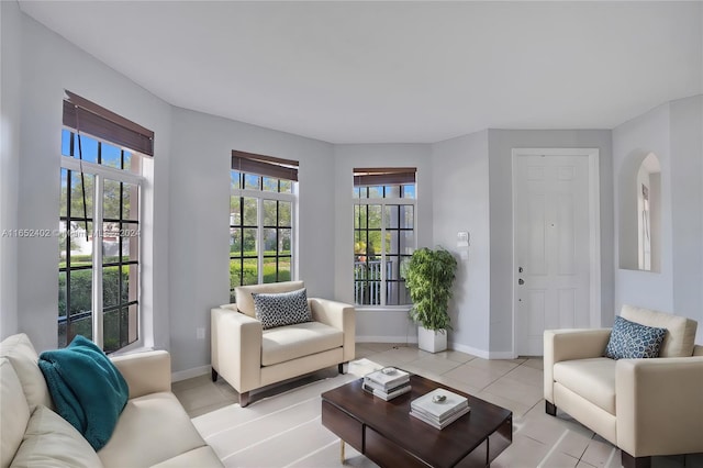 living room with light tile patterned floors