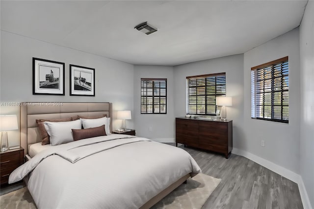 bedroom featuring light hardwood / wood-style floors