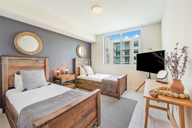 bedroom featuring light wood-type flooring