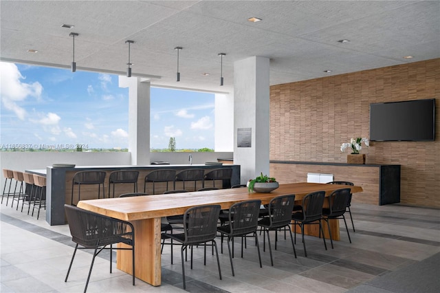 dining area featuring expansive windows