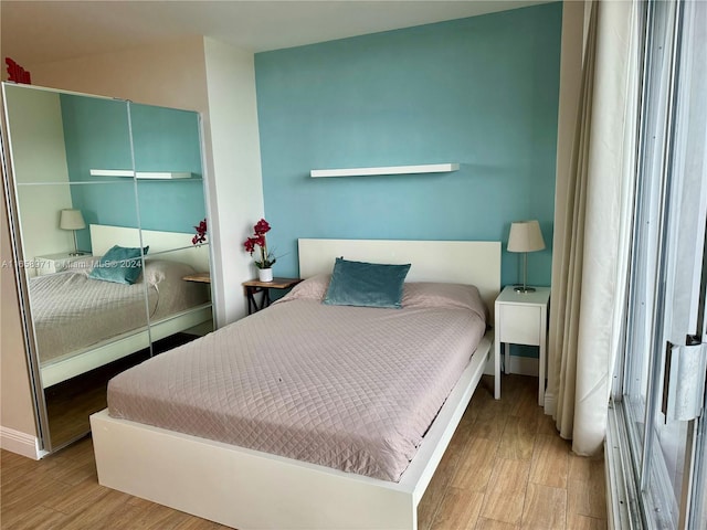 bedroom featuring light hardwood / wood-style flooring