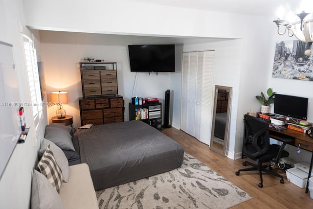 bedroom with hardwood / wood-style floors