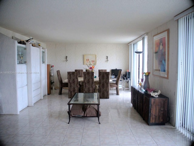 living room with a textured ceiling