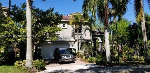 view of property with a garage