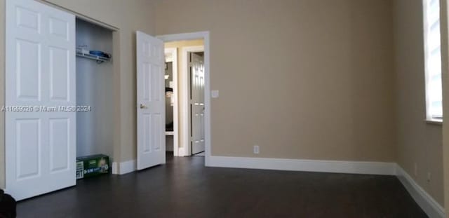 unfurnished bedroom featuring a closet