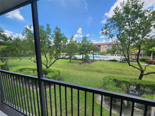 exterior space featuring a balcony and central AC