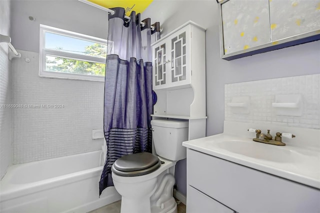 full bathroom with vanity, toilet, and shower / bath combo