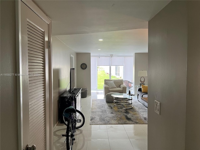 tiled living room with expansive windows