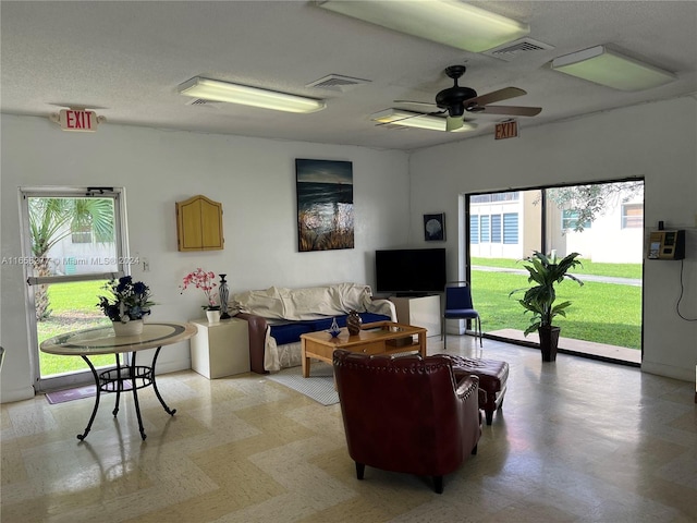 living room with ceiling fan