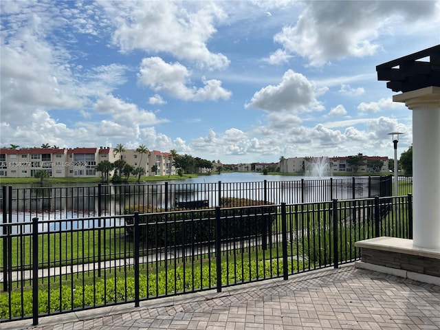 exterior space with a water view