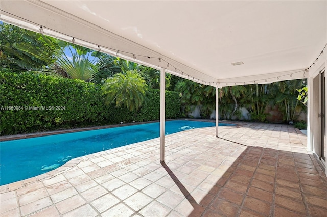 791 Allendale Rd, Key Biscayne, FL 33149 - view of swimming pool with a patio area and a fenced backyard