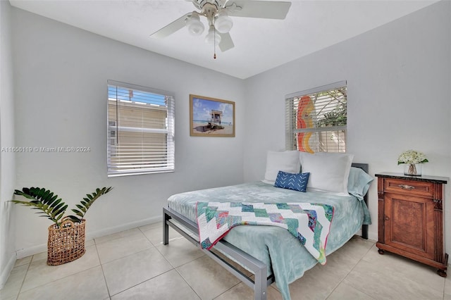 bedroom featuring ceiling fan and light tile patterned floors