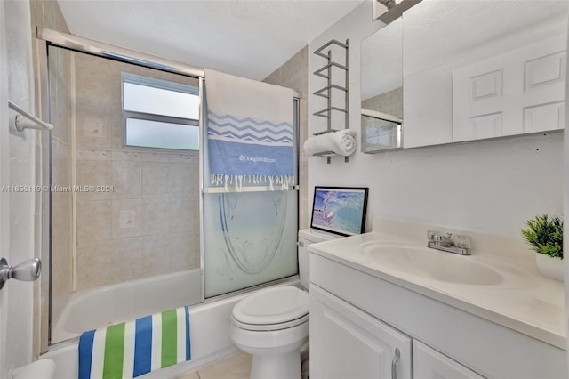 full bathroom with vanity, toilet, and enclosed tub / shower combo