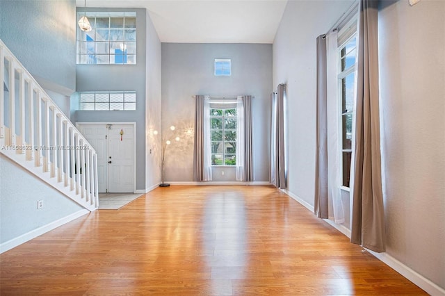 foyer entrance with light hardwood / wood-style flooring