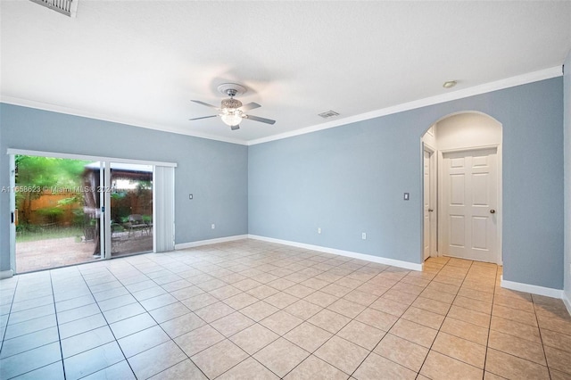 unfurnished room featuring crown molding, light tile patterned floors, and ceiling fan