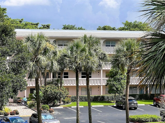 2002 Granada Dr Unit J3, Coconut Creek, FL 33066 - view of property featuring uncovered parking