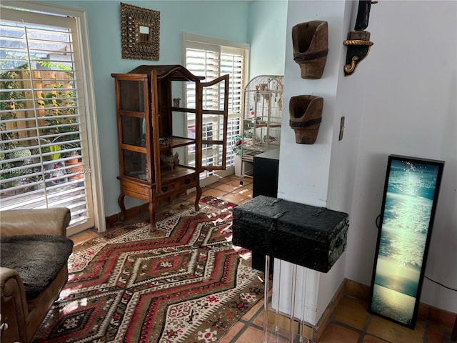 sitting room with tile patterned flooring