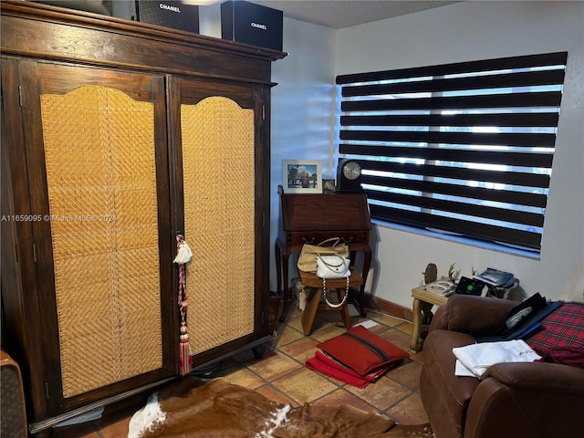 bedroom featuring tile patterned flooring