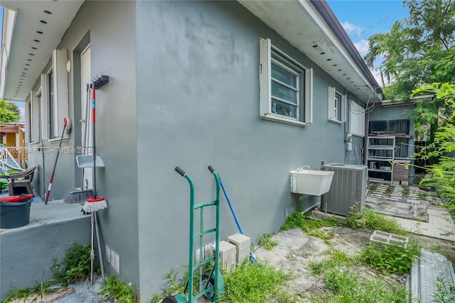 view of home's exterior featuring central air condition unit