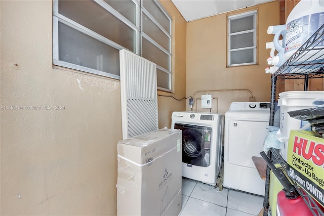 washroom with washer and clothes dryer