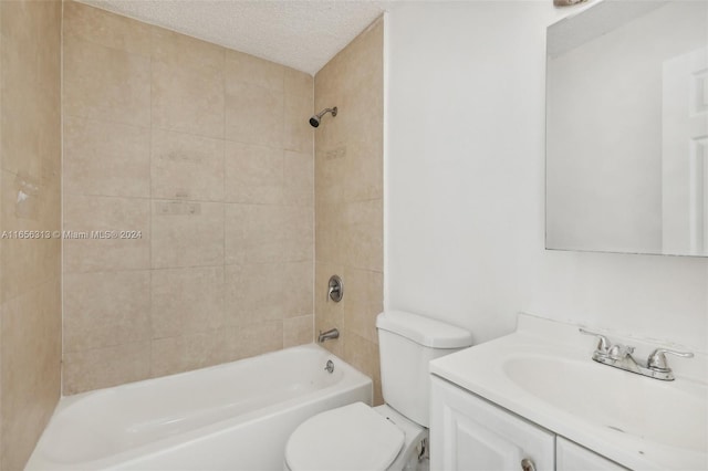 full bathroom with vanity, a textured ceiling, toilet, and shower / washtub combination