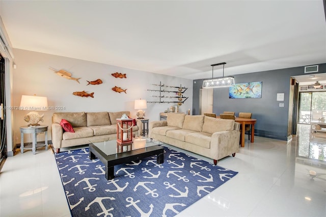 tiled living room with plenty of natural light