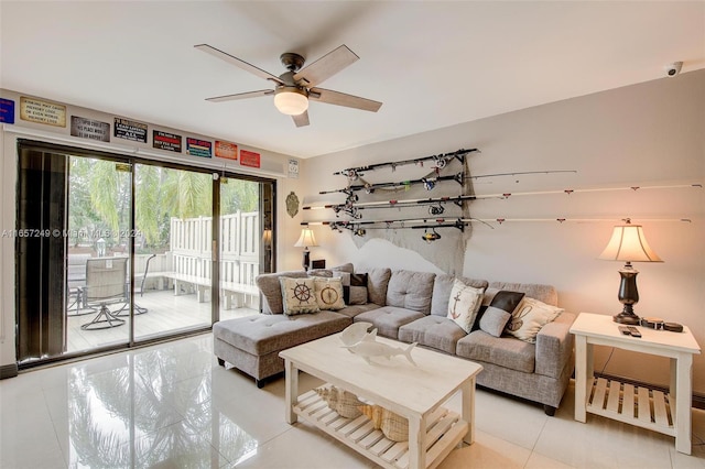 tiled living room with ceiling fan