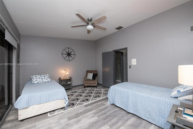 bedroom featuring ceiling fan and vaulted ceiling