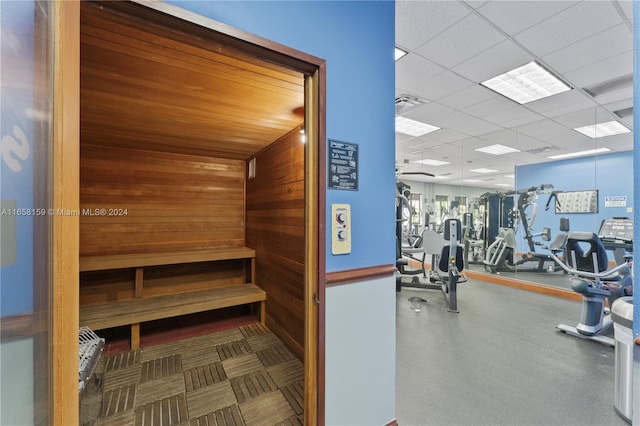 view of sauna / steam room featuring wood walls