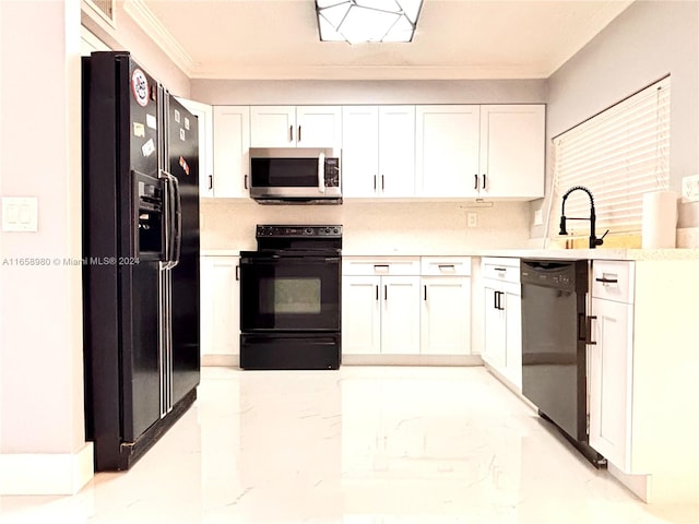 kitchen with black appliances, ornamental molding, sink, and white cabinetry