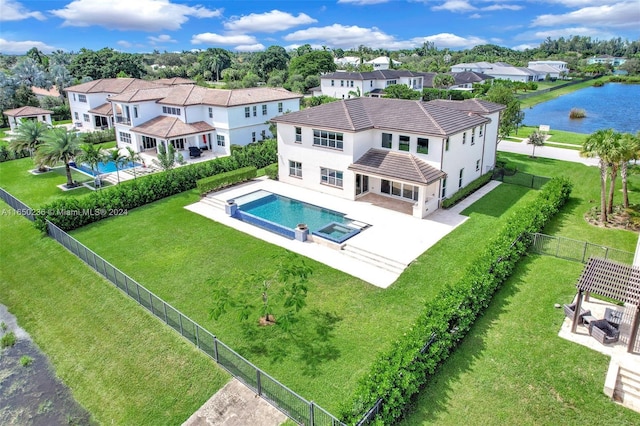 5458 E Stillwater Shores Dr, Davie, FL 33314 - back of property with a water view, stucco siding, a patio area, and a residential view