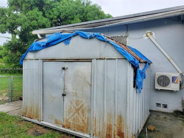 view of outbuilding with ac unit