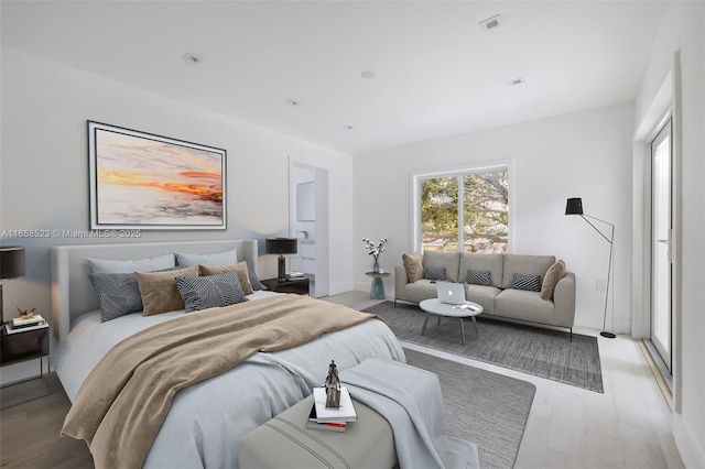 bedroom with light wood-style floors