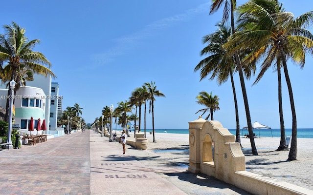 view of home's community with a view of the beach and a water view