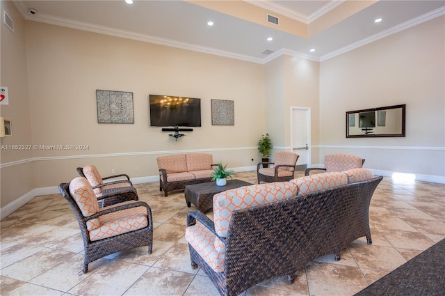 living room with light tile patterned floors and ornamental molding