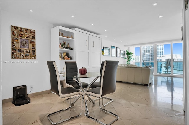 dining room with expansive windows