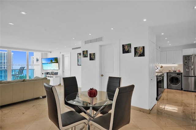 dining area featuring washer / dryer