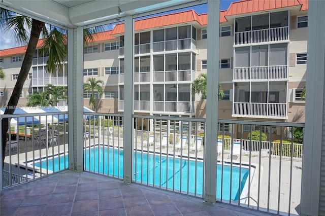 view of swimming pool with a patio area