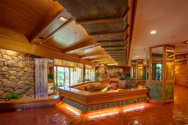 interior space featuring wood ceiling and beam ceiling