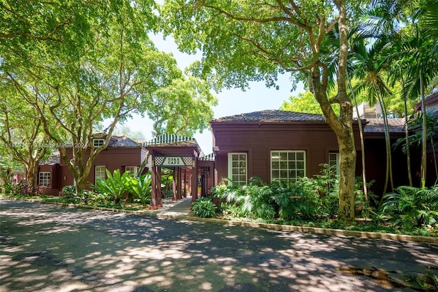 view of front facade with a pergola