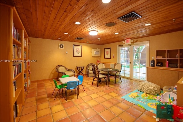 game room with wooden ceiling, french doors, and light tile patterned floors