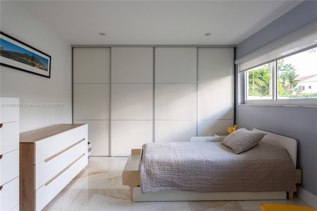 bedroom with marble finish floor