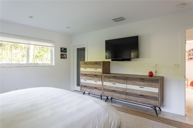 bedroom with visible vents