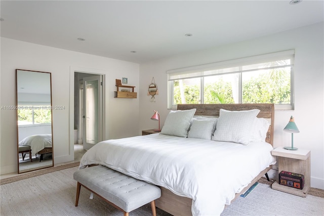 bedroom with light hardwood / wood-style flooring