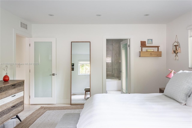 bedroom featuring baseboards, visible vents, connected bathroom, and recessed lighting