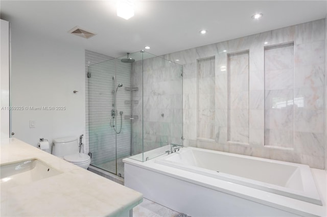 bathroom featuring a garden tub, toilet, visible vents, tile walls, and a stall shower